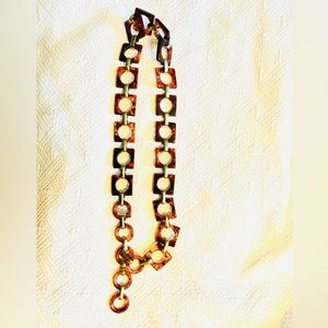 Vintage YSL tortoise shell and bronze belt